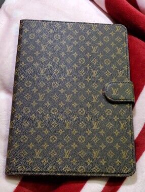 Black Tablet with Blue Screen Apple Ipad With Cases Info In The Pictures